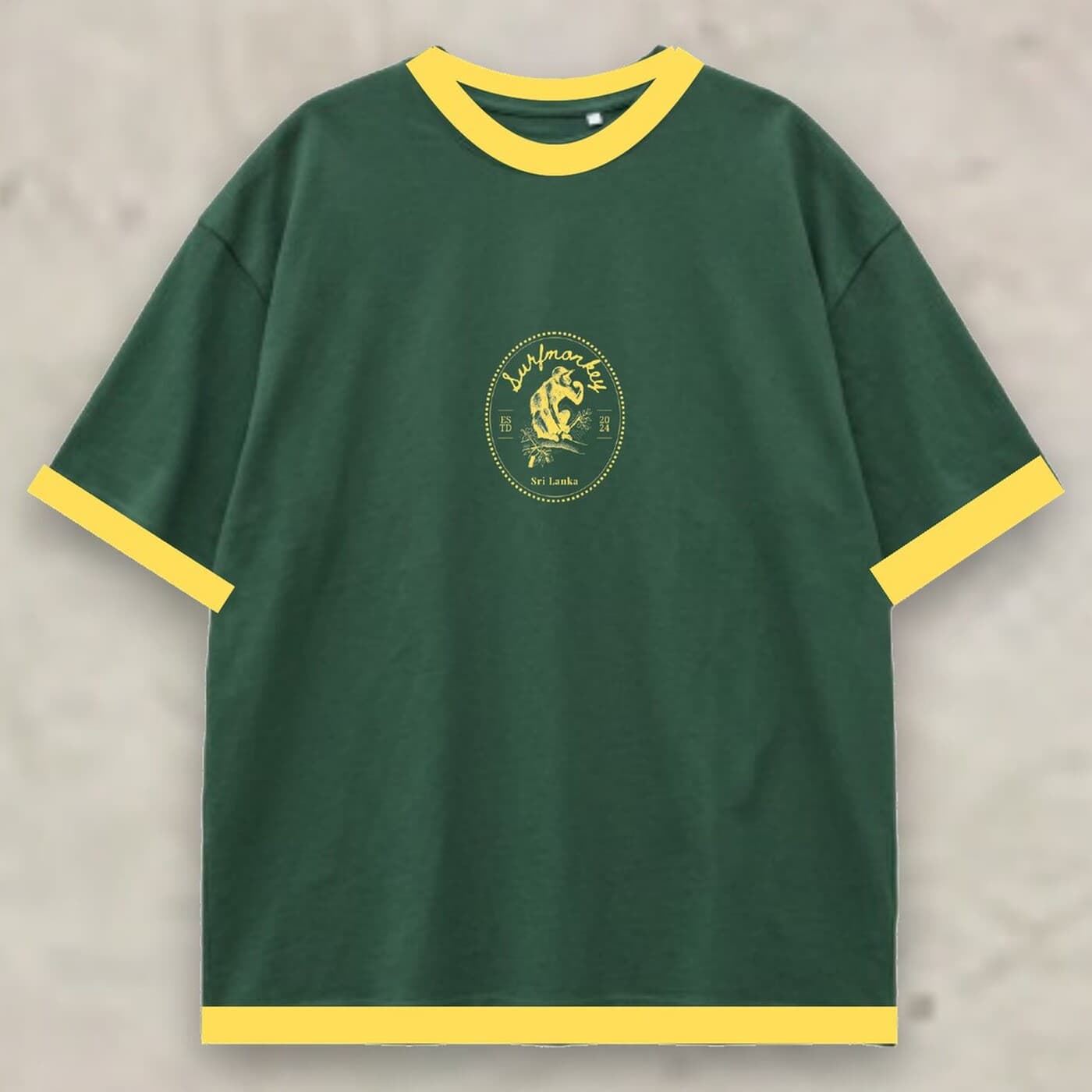 Jungle Crest Tee in olive green with orange ringer trim